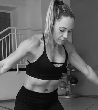 Poppy Barlow-Griffin, Pilates Instructor at The Body Workshop Pilates, at the beach - her favourite place